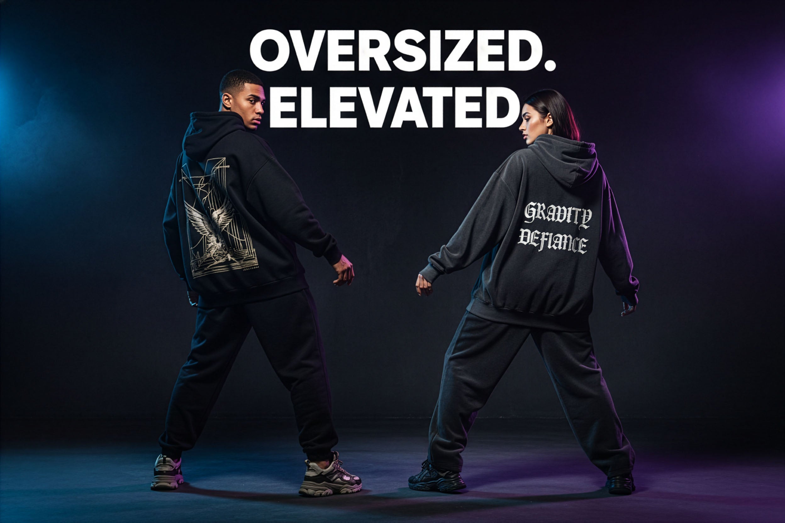 Two people wearing oversized clothing with text 'Oversized. Elevated.' and 'Gravity Defiance' on a dark background.